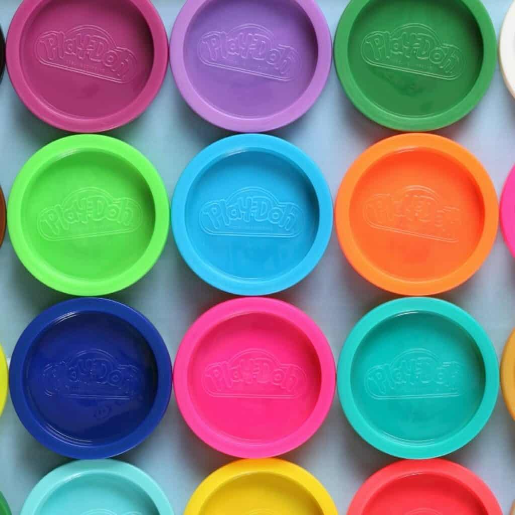 top shot of small containers of play doh